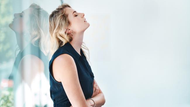 Shot of a young businesswoman looking stressed out in an office Picture: Istock