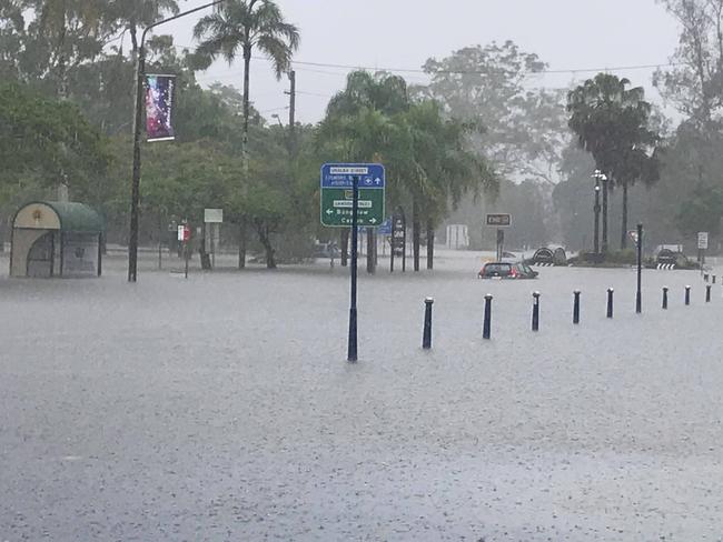 A driver was caught in flood water in Lismore CBD.