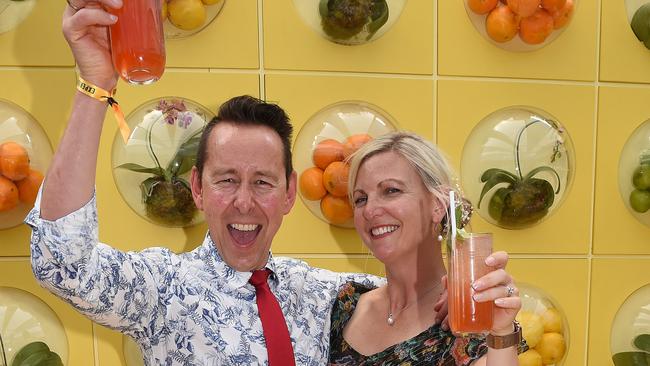 MELBOURNE, AUSTRALIA - NewsWire Photos, NOVEMBER 7, 2023. All the colour and excitement from the race that stops a nation. Steve (wearing shorts) and Kate Plarre at the Schwepps marquee. Picture: NCA NewsWire / Josie Hayden