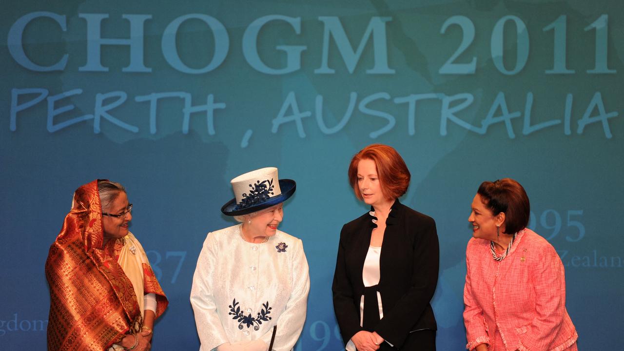 The Queen chats to the official female heads of state in Perth in 2011, including former Australia prime minister Julia Gillard. Picture: Torsten Blackwood/ POOL / AFP