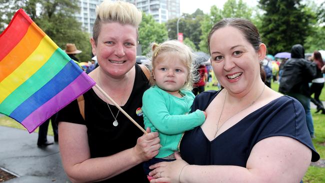 Jaye Hurley and Mandy Smith with their daughter Emily, celebrating the Yes result. Picture: Calum Robertson