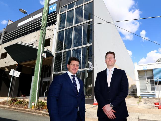 Picture of Nick Wedge (tall person) and Hunter Higgins in front of 40 and 42 Campbell Street, Bowen Hills a massive site they have recently sold. Bowen Hills Wednesday 30th August 2023 Picture David Clark