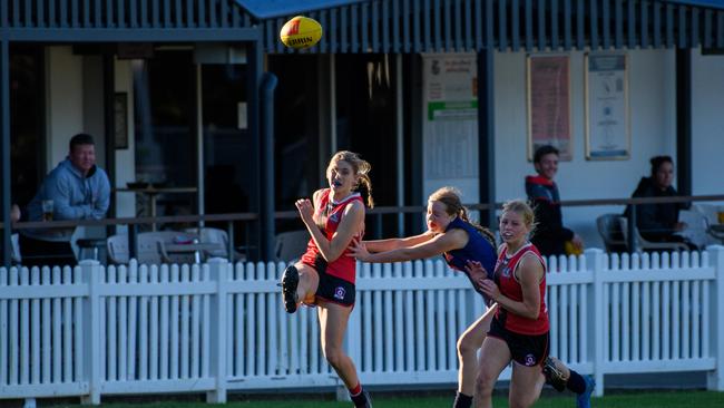 Anneliese Neary kicks clear against Tweed Coolangatta