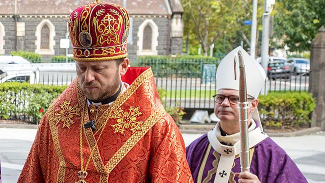 Ukrainian Bishop Mykola Bychok and Archbishop Peter Comensoli attend mass at St Patrick's Cathedral, Melbourne. Bishop Bychok has now been named as a Cardinal by Pope Francis. Picture: Mark Stewart