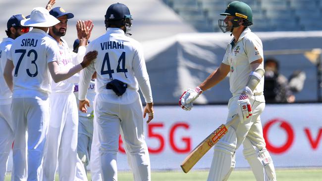 Joe Burns walks off after he was dismissed by India at the MCG Picture: AFP