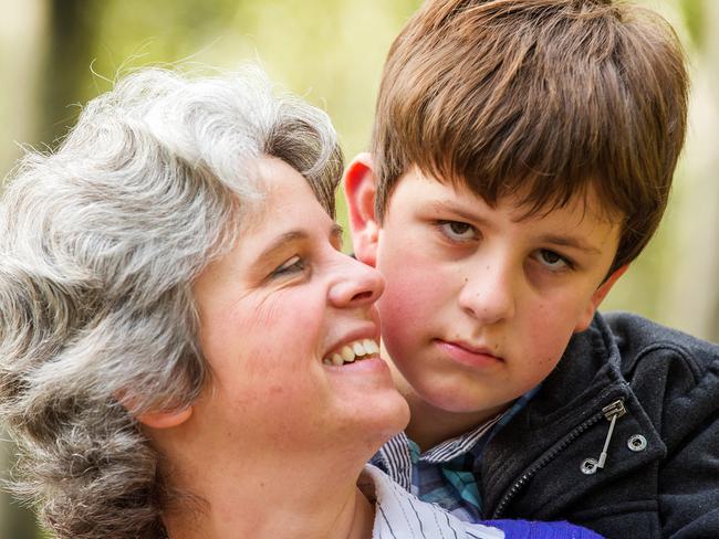 Luke Shambrook, 11, who has autism, was miraculously found alive after five days lost in the forest. He has been nominated for a Pride of Australia Child of Courage Award by Victoria Police, specifically Sgt Greg Paul. Luke is pictured with mother Rachel. Picture: Mark Stewart