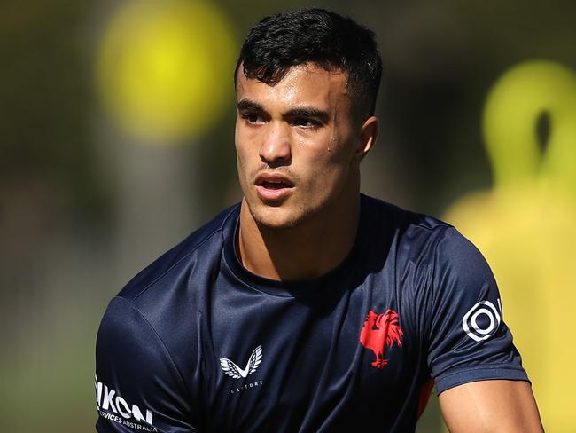 SYDNEY, AUSTRALIA - MARCH 29: Joseph Suaalii passes during a Sydney Roosters NRL training session at Kippax Lake on March 29, 2021 in Sydney, Australia. (Photo by Matt King/Getty Images)