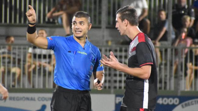 Daniel Simic is yellow carded in Magpies Crusaders v Sunshine Coast Fire in the FQPL1 at Sologinkin Oval. Saturday, March 19, 2022. Picture: Tara Miko