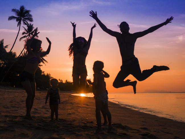 Crowd people friends sunset beach holidays