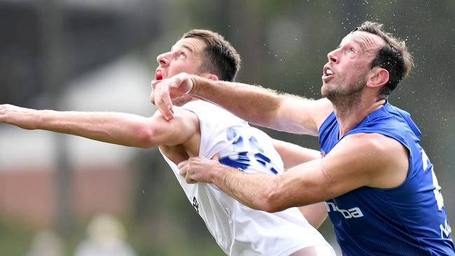 Todd Goldstein (right) hit the ton against the Western Bulldogs, while Tristan Xerri (left) showed potential as a back-up. Picture: Morgan Hancock/Getty Images