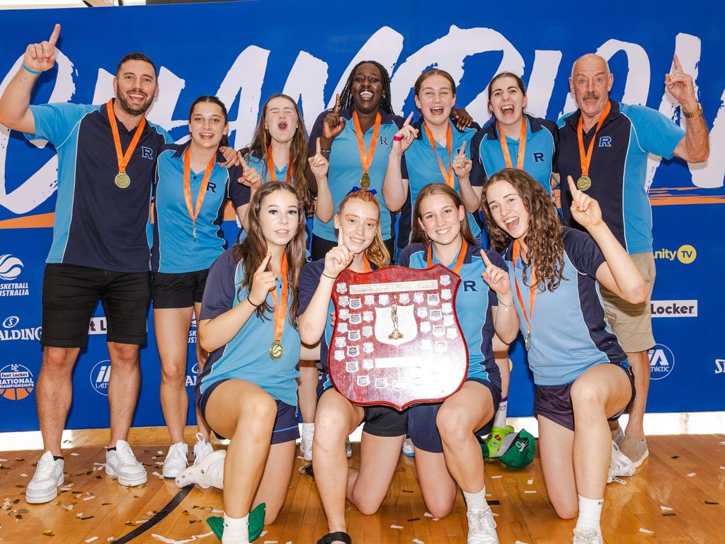 Ex-NBL players Adam Gibson (left) and Dean Kinsman (right) with the Rowville Championship girls during the 2023 Basketball Australia Schools Championships Picture: Taylor Earnshaw