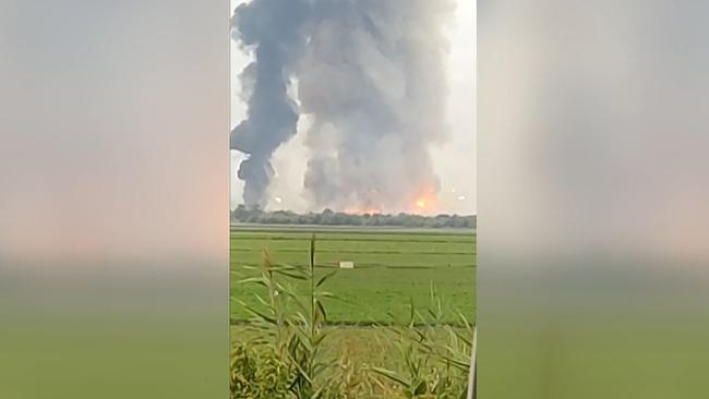 The burning munitions depot in Crimea early on August 16, 2022. Picture: Marie-Laure Messana/ESN/AFP
