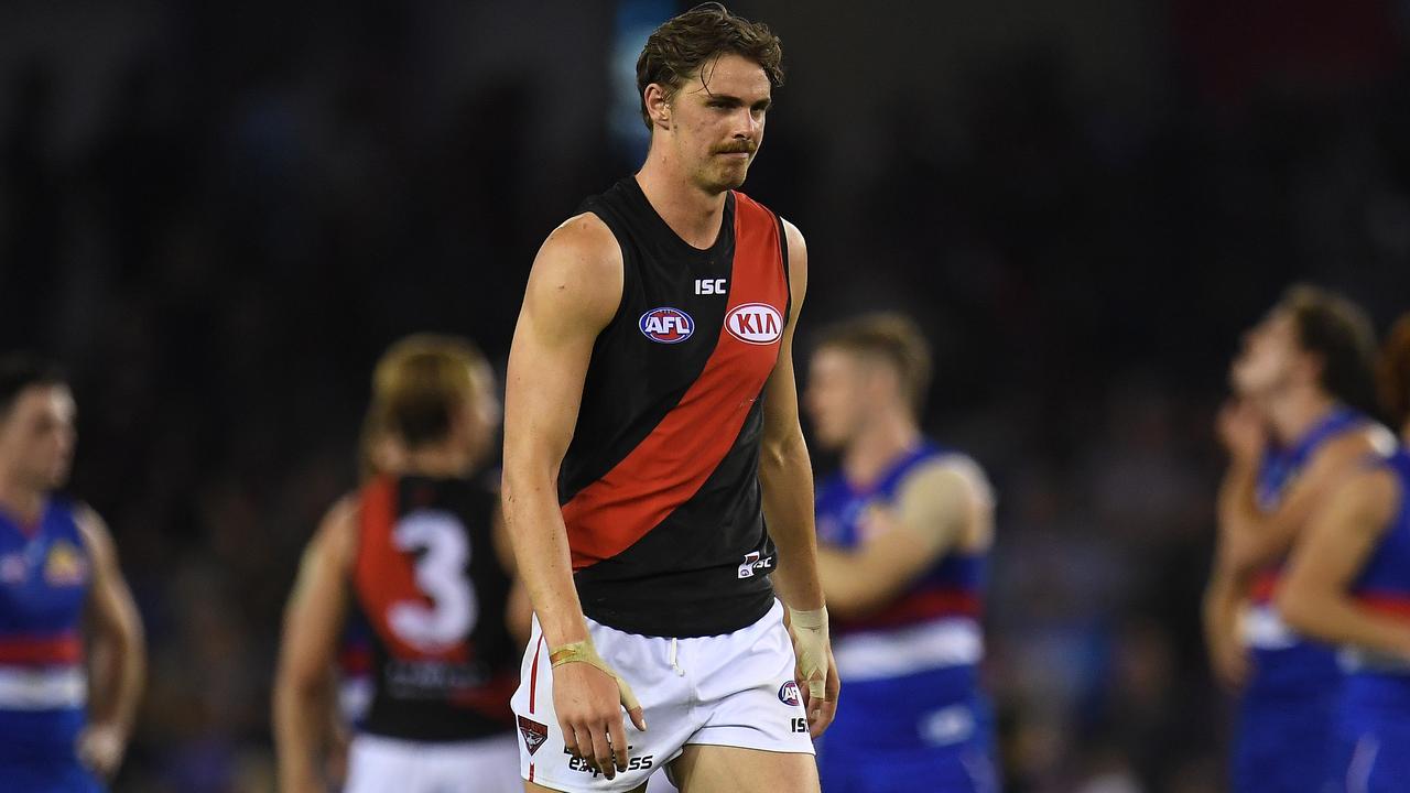Joe Daniher leaves the ground after Essendon’s loss to the Western Bulldogs. (AAP Image/Julian Smith)