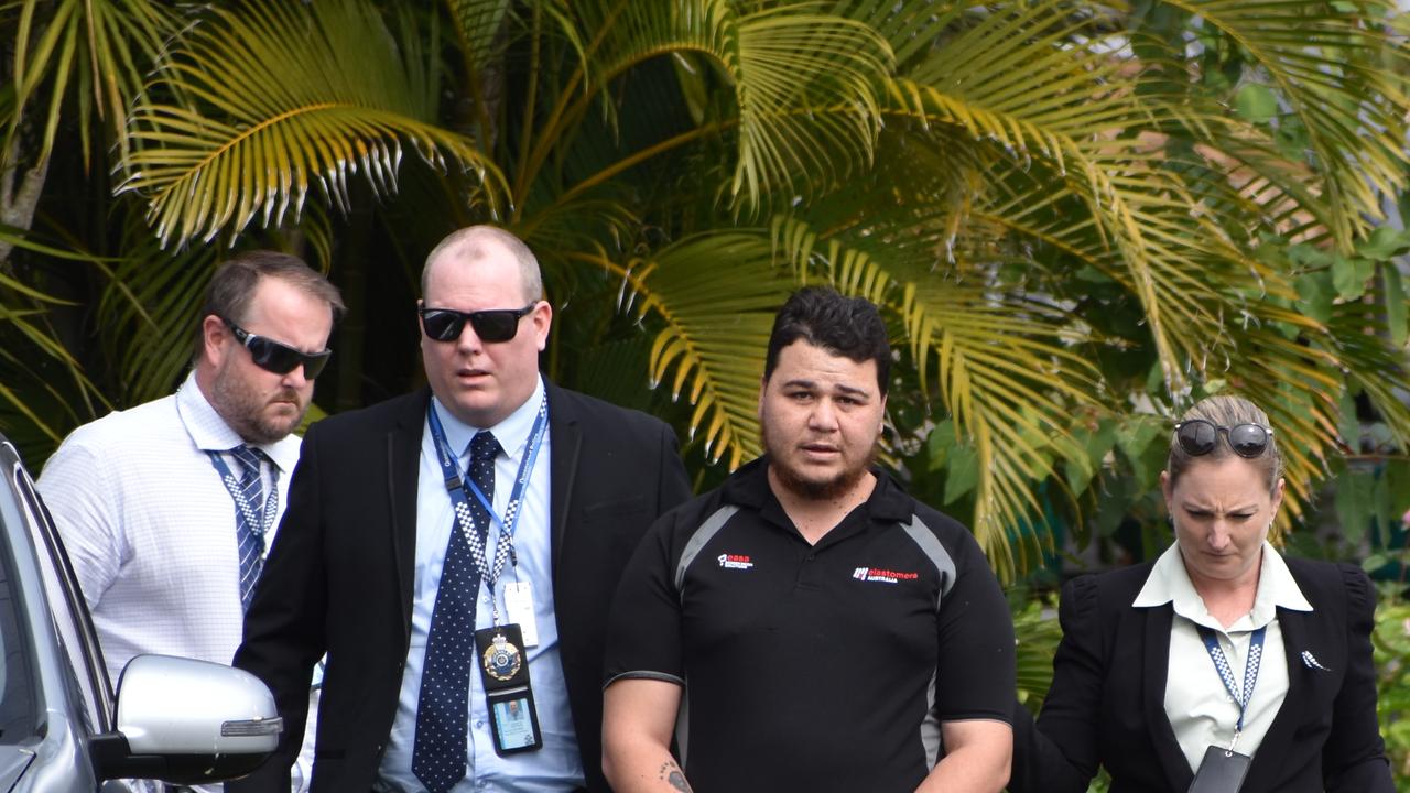 Ayden Bradshaw (second from right) is arrested in connection to the death of his son, six-month-old baby Beau Bradshaw. Photo: Tara Miko