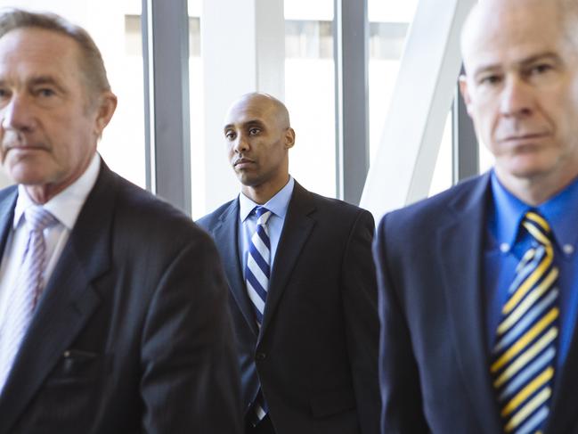 Mohamed Noor, centre, labelled Justine Ruszczyk Damond “a threat” in his testimony. Picture: Angus Mordant 