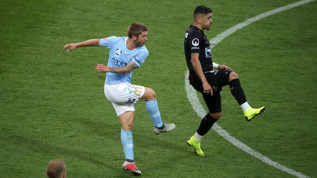 Melbourne City’s Luke Brattan unleashes a volley from long range to score against Newcastle Jets at AAMI Park. Picture: AAP