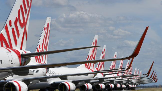 Airlines everywhere are grounding fleets, including Virgin Australia. Picture: AAP/Darren England