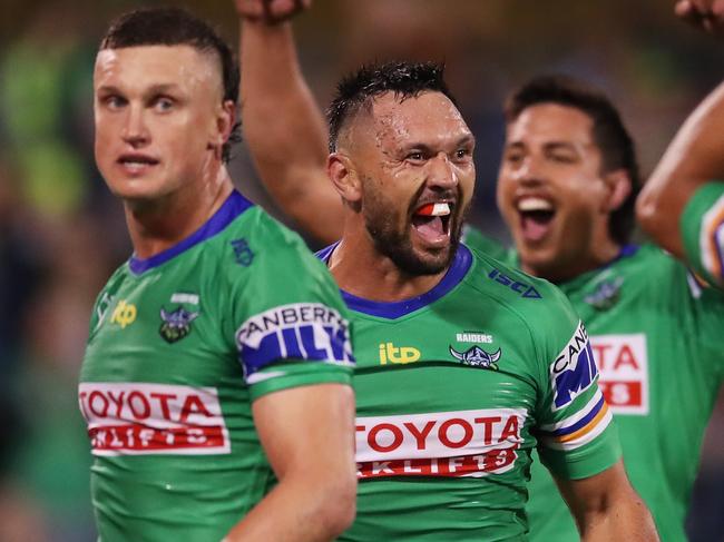 CANBERRA, AUSTRALIA - MARCH 26: Jordan Rapana of the Raiders celebrates victory with team mates after the round three NRL match between the Canberra Raiders and the Gold Coast Titans at GIO Stadium, on March 26, 2022, in Canberra, Australia. (Photo by Matt King/Getty Images)