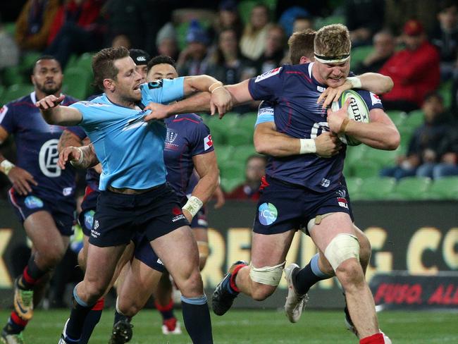 Waratahs manage to bring down Matt Philip. Picture: AAP