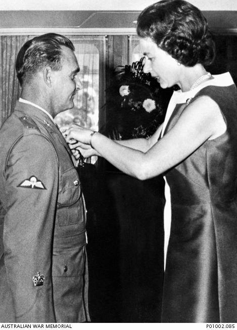 WO2 Keith Payne receives the Victoria Cross from  Queen Elizabeth II aboard the royal yacht Britannia in 1970. (Accession Number P01002.085). Picture: Australian War Memorial
