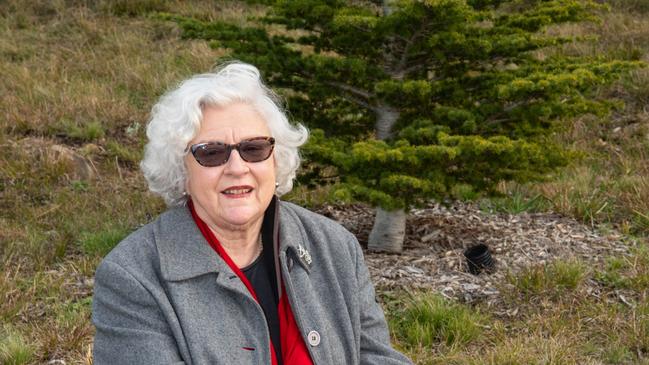 Margaretta Pos in front of the replacement tree planted for her grandfather Oliver Page on the Soldiers’ Memorial Avenue. Picture: ALASTAIR BETT