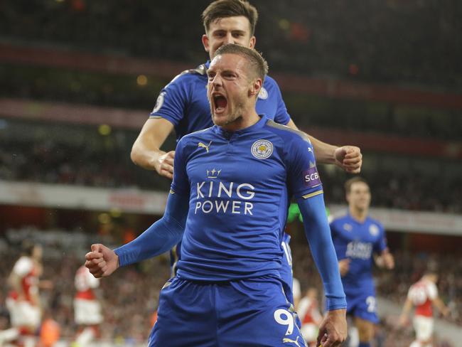 Leicester City's Jamie Vardy, centre celebrates with teammates after scoring his sides third goal.