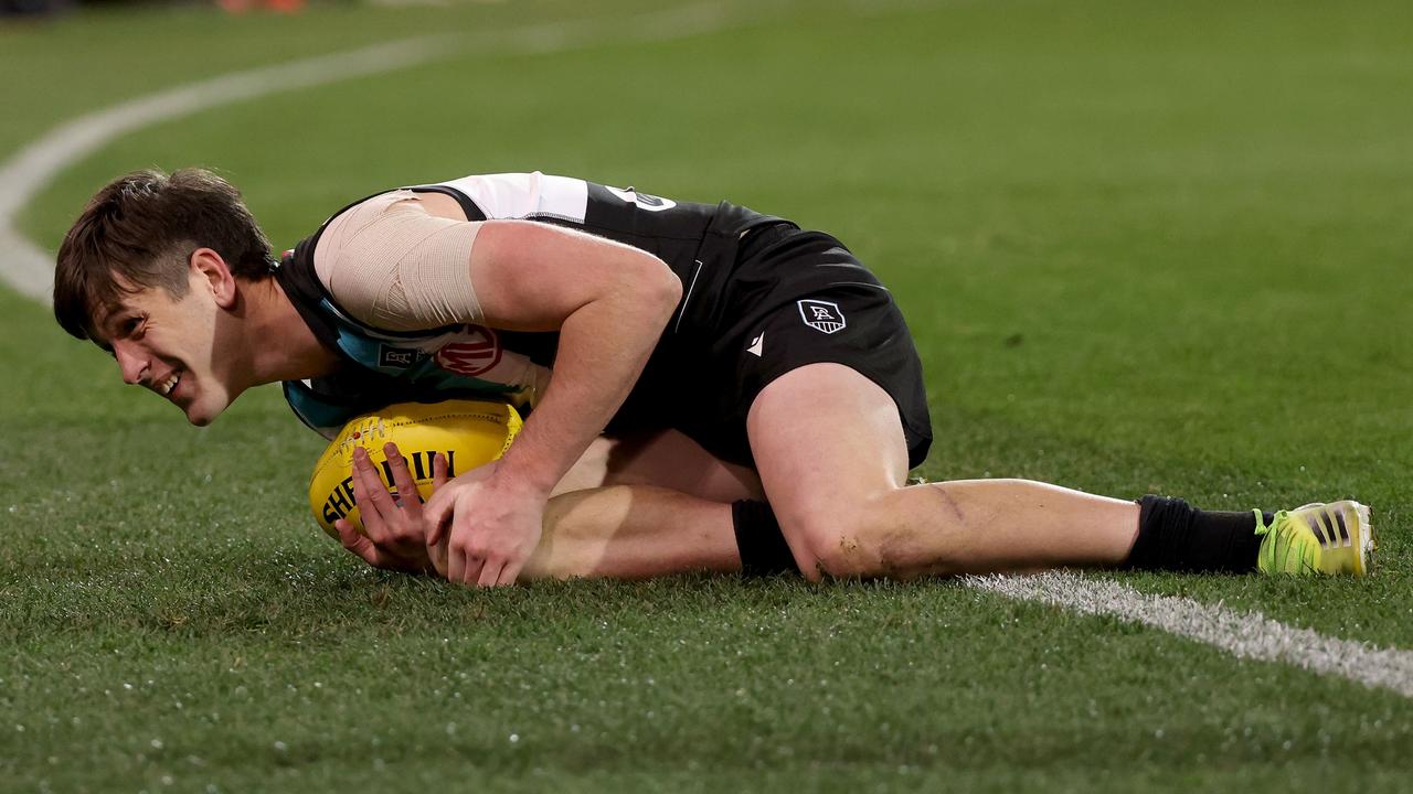 Zak Butters injured his knee in his return game against Melbourne. (Photo by James Elsby/AFL Photos via Getty Images)