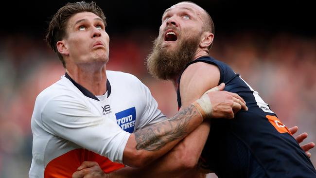 Rory Lobb battles against Max Gawn.