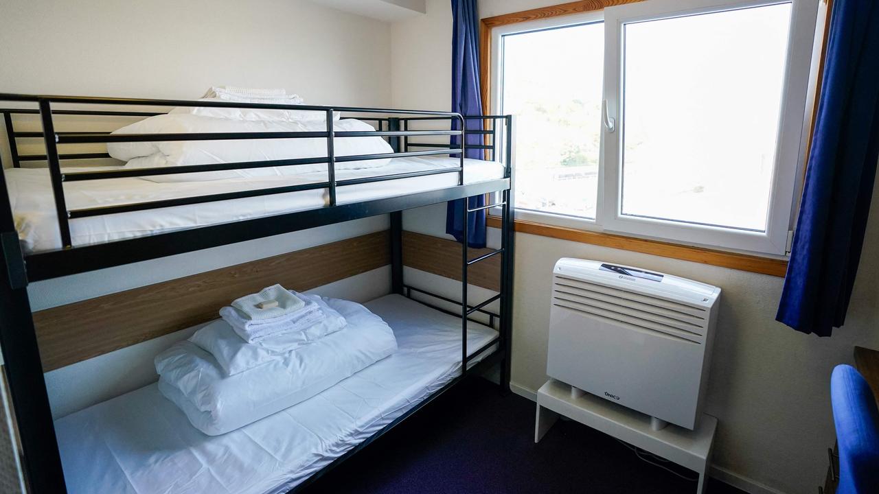 Bunk beds inside one of the bedrooms onboard the Bibby Stockholm accommodation barge. Picture: Andrew Matthews/POOL/AFP