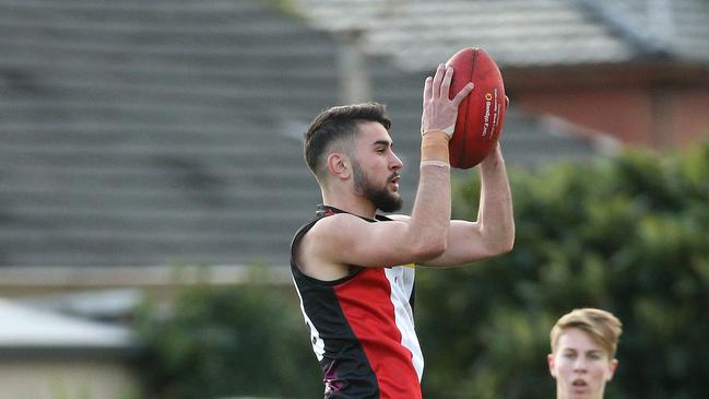 EDFL footy: East Keilor v West Coburg: Ibrahim Tahaof West Coburg marks Saturday, June 19, 2021, in East Keilor, Victoria, Australia. Picture: Hamish Blair