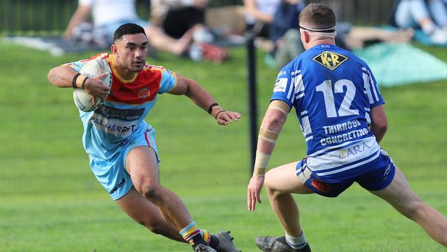 De La Salle centre Tyla Tamoa with a big step to get around Harry Leddy. Picture: Steve Montgomery | OurFootyTeam