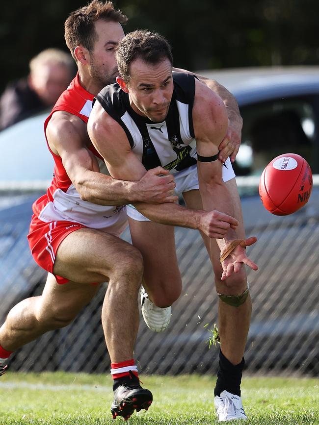 Clarence's Clint Riley tackles Glenorchy's Jaye Bowden. Picture: Zak Simmonds