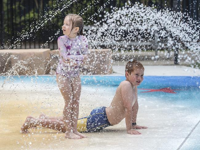 Layla Lamb, 6, and Kai Napton, 8, at play in the Peninsula Leisure Centre's new $1M aquatic park. The park officially opened today. Picture: News Local / Troy Snook