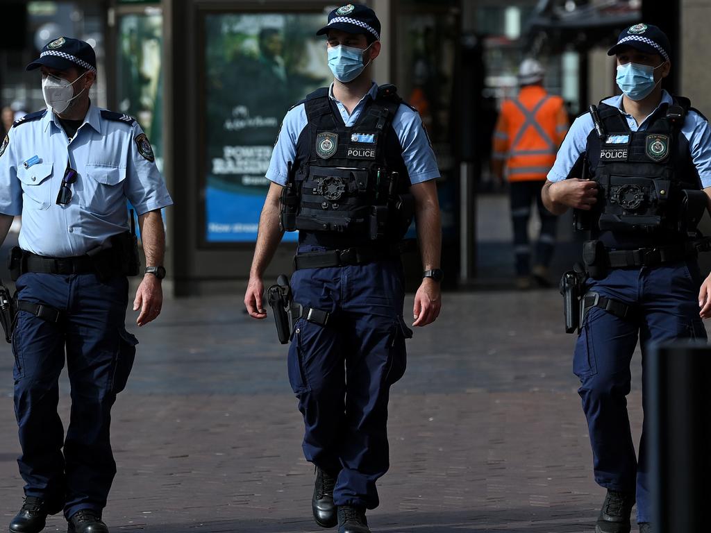 NSW Police officers patrol the Circular Quay ferry terminal before the anti-lockdown protest. Picture: NCA NewsWire/Bianca De Marchi