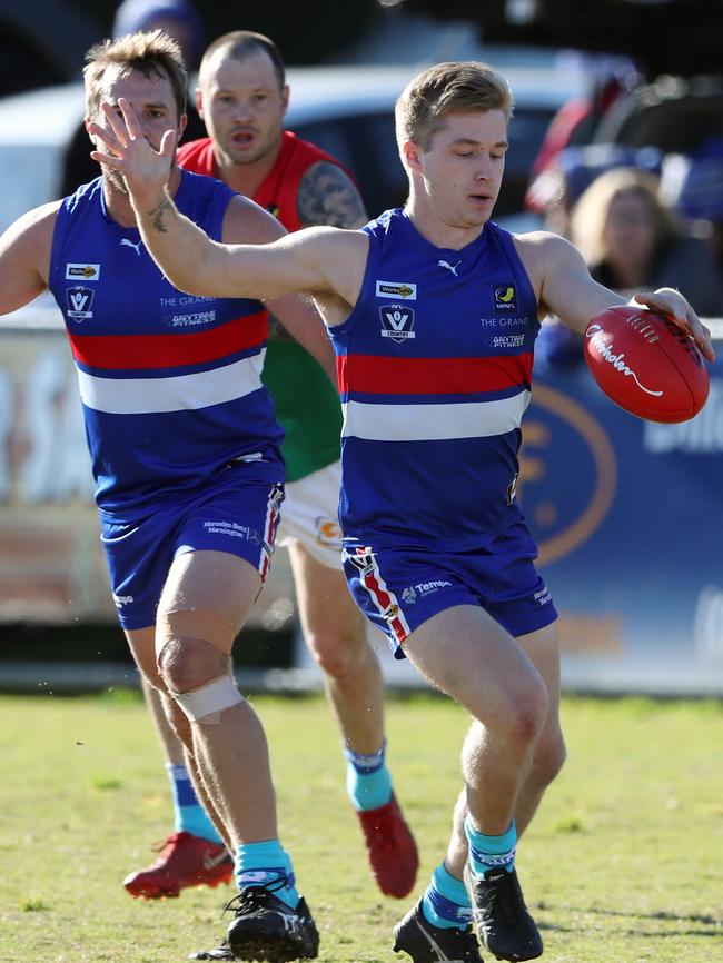 Mornington’s Kalen Bird swings on to his left.