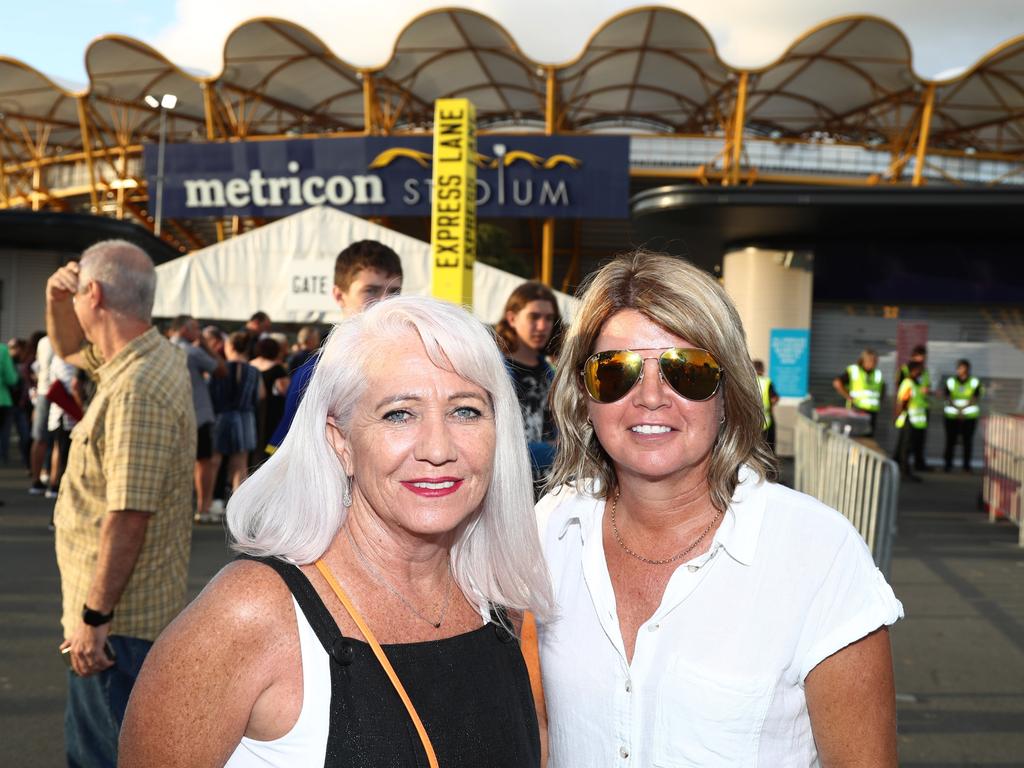 Erika Bolam and Karen Turner from the Sunshine Coast arrive at Metricon Stadium to see Queen Live. Photograph :Jason O'Brien