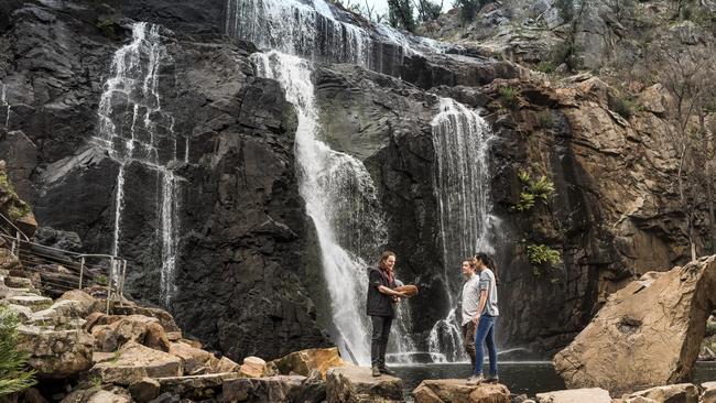 An Aboriginal tour guide at the stunning Mackenzie Falls. Picture: Tourism Victoria