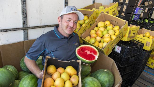 Anthony Hurle with fruit that helps to fund Tony's Kitchen in Toowoomba.