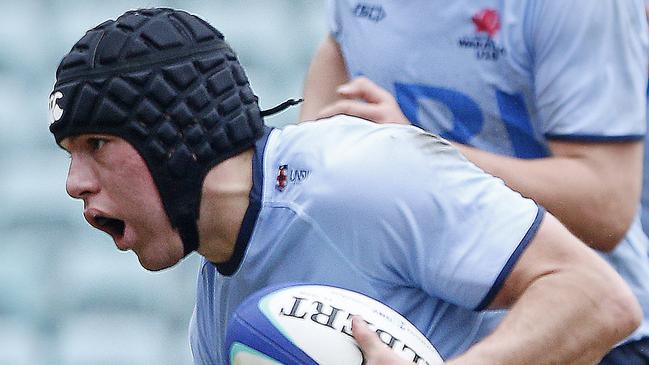 Waratahs' Brendan Palmer with the ball. Under 19s Waratahs  v Melbourne Rebels in Super Rugby National Championships Round 1 at Leichhardt Oval. Picture: John Appleyard.