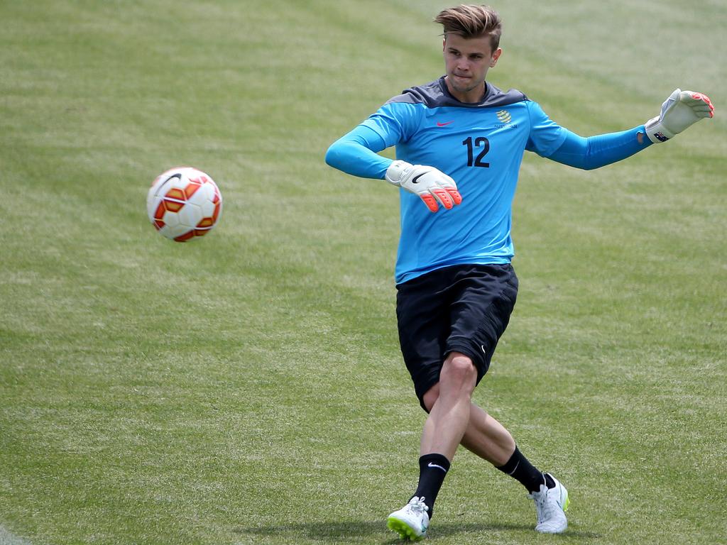 Mitch Langerak works hard at a Socceroos training session in 2015. Picture: George Salpigtidis