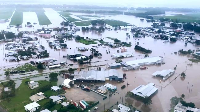 Aerial view of Ingham at 10.24am from a rescue helicopter of the flood water covering the town. Photo – QAS