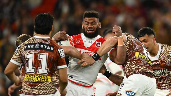 BRISBANE, AUSTRALIA - JULY 13: Mikaele Ravalawa of the Dragons is tackled during the round 19 NRL match between Brisbane Broncos and St George Illawarra Dragons at Suncorp Stadium, on July 13, 2024, in Brisbane, Australia. (Photo by Albert Perez/Getty Images)