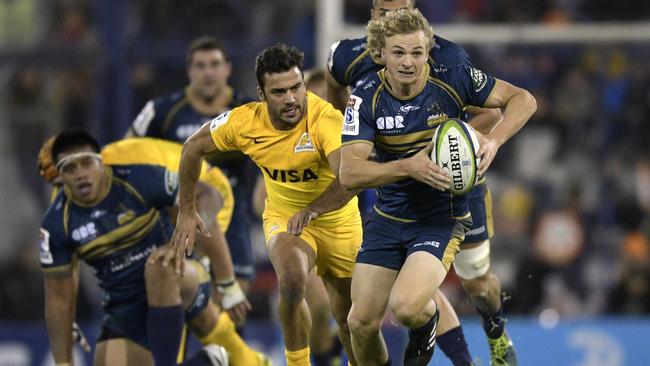 Australia's Brumbies scrum-half Joe Powell (R) is expected to keep the No 9 jersey despite Tomas Cubelli’s return.