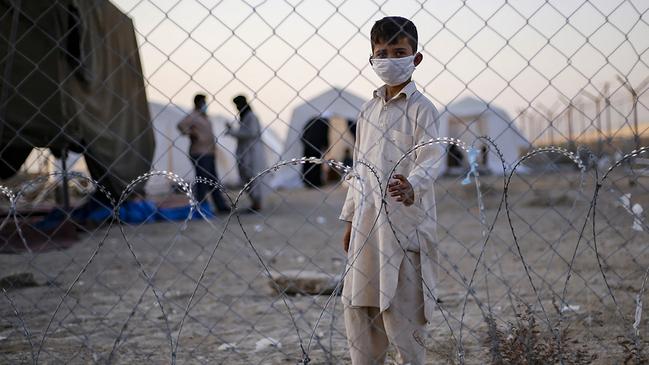 A young Afghan refugee at the Iran-Afghanistan border. Picture: Mohammad Javadzadeh/Iranian Red Crescent/AFP