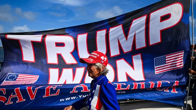 Trump supporters celebrate his victory near his Mar-a-Lago resort in Palm Beach. Picture: AFP.