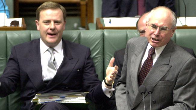 Then treasurer Peter Costello and prime minister John Howard during question time on November 30, 2000. Picture: Michael Jones