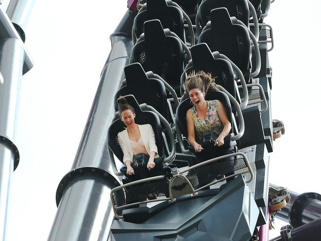 Gold Coast Bulletin tackles the DC Rivals HyperCoaster, which will officially open at Warner Bros. Movie World on Friday. Journalists Kate Donadini and Amanda Robbemond take up the challenge. Picture Glenn Hampson.