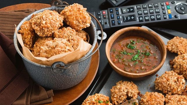 Peanut and pretzel chicken with bloody mary dipping sauce.