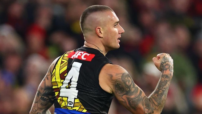 MELBOURNE, AUSTRALIA - MAY 25: Dustin Martin of the Tigers celebrates kicking a goal during the round 11 AFL match between Richmond Tigers and Essendon Bombers at Melbourne Cricket Ground, on May 25, 2024, in Melbourne, Australia. (Photo by Quinn Rooney/Getty Images)