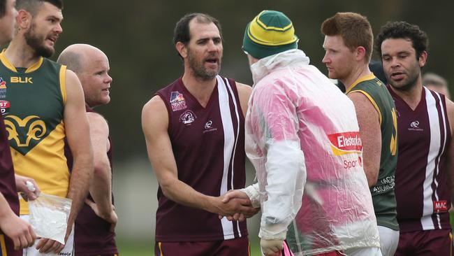 Trevor Rigney is congratulated after one of his many 100-goal seasons. Picture: Dean Martin